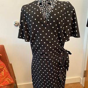 Black and white polka dot wrap dress.